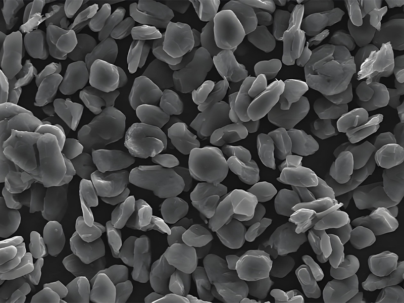 Microscopic view of graphite anode structure showing layered formation ideal for lithium ion storage